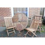 A Prestige teak garden set of table, AF, 120cm diameter, with lazy susan, and four folding chairs