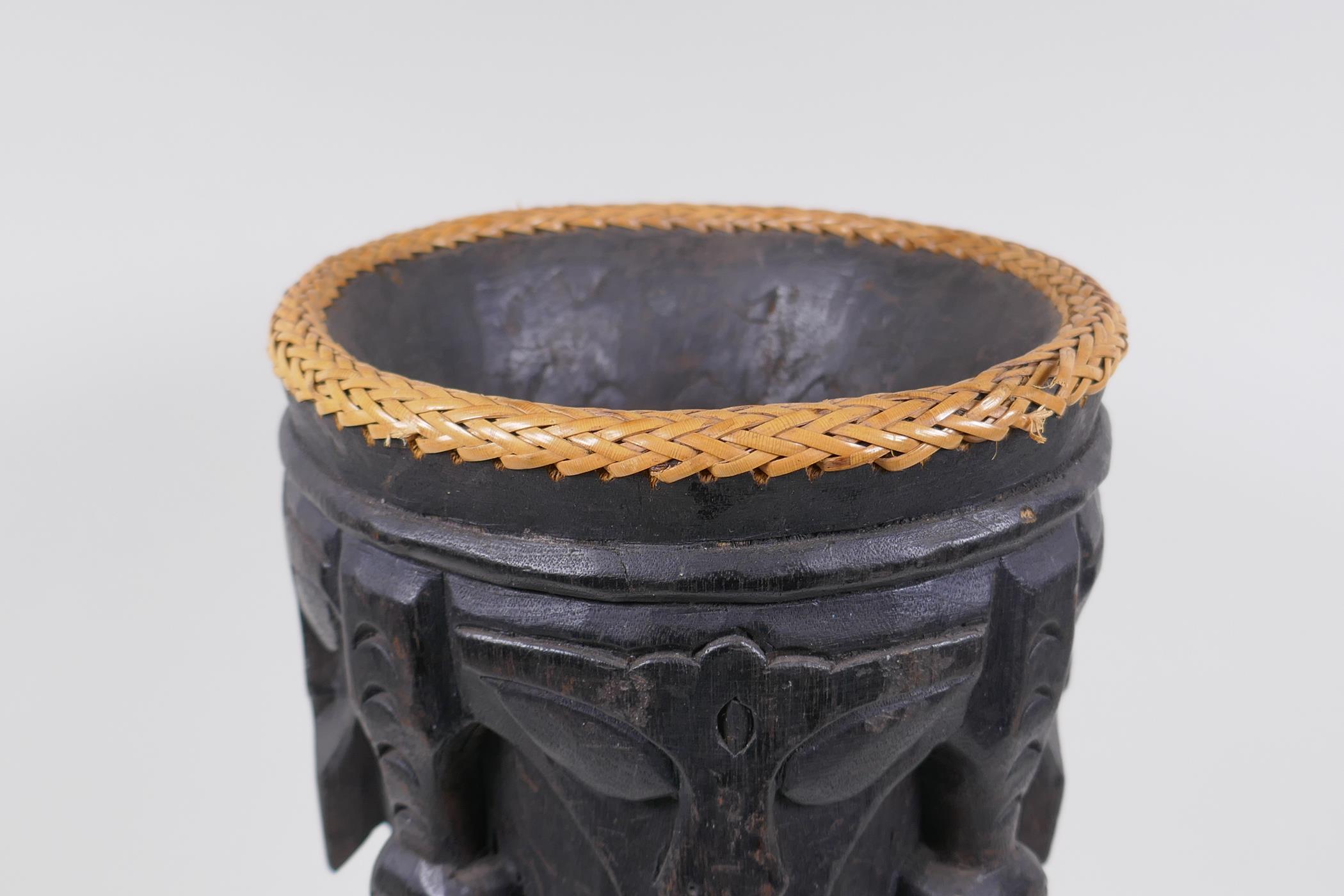 An Indonesian Dayak tribal carved and ebonised wood stick stand with figural and animal - Image 5 of 6