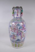 A C19th Chinese famille rose porcelain vase, with two figural handles and decorative panels