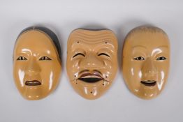 Three Japanese papier mache Noh masks, 22cm