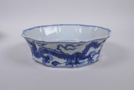 A Chinese blue and white porcelain dish with lobed rim and dragon decoration, Xuande 6 character