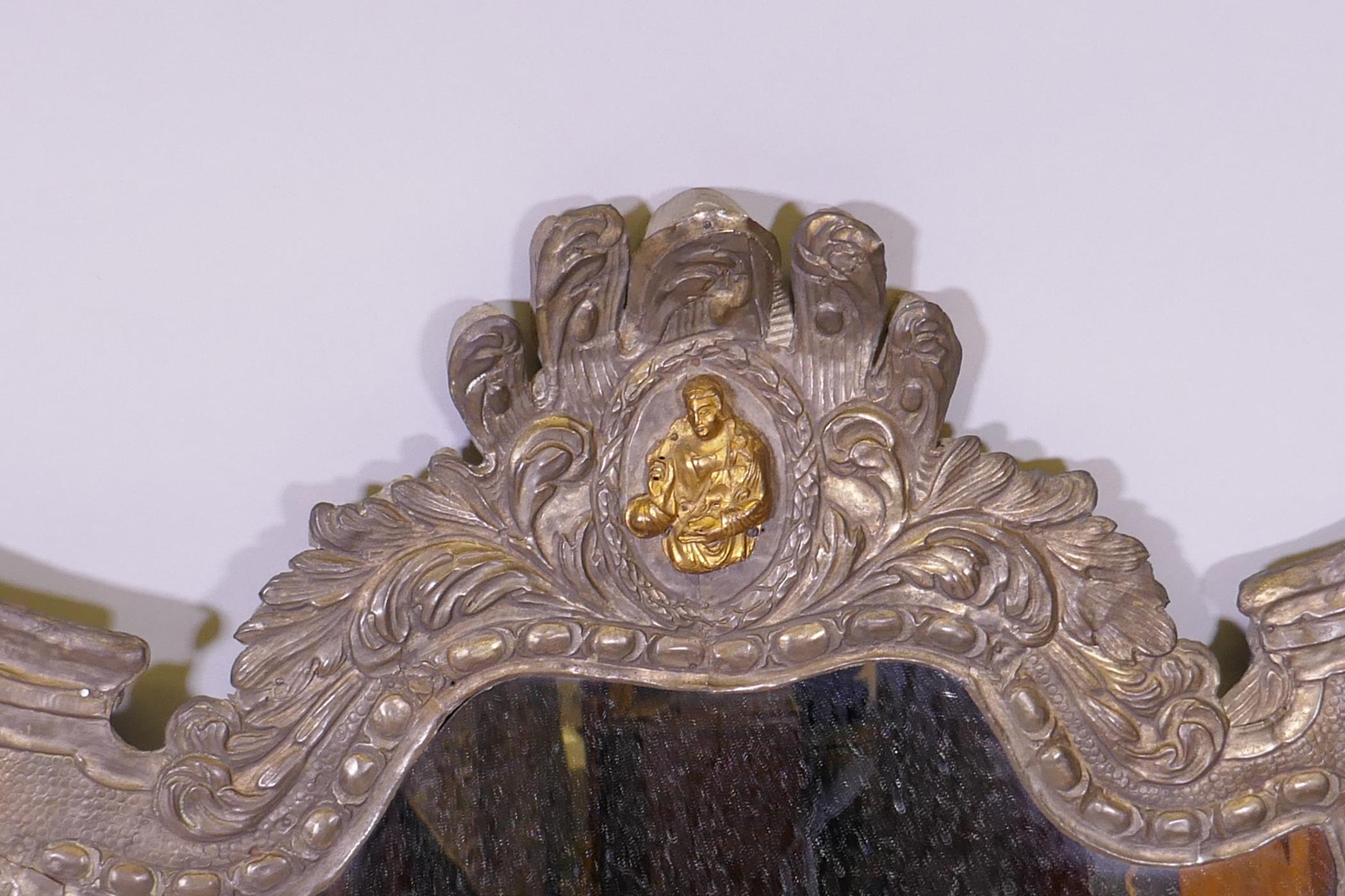 A C19th continental wall mirror, the repousse white metal covers with decorative ormolu mounts, 75 x - Image 2 of 3