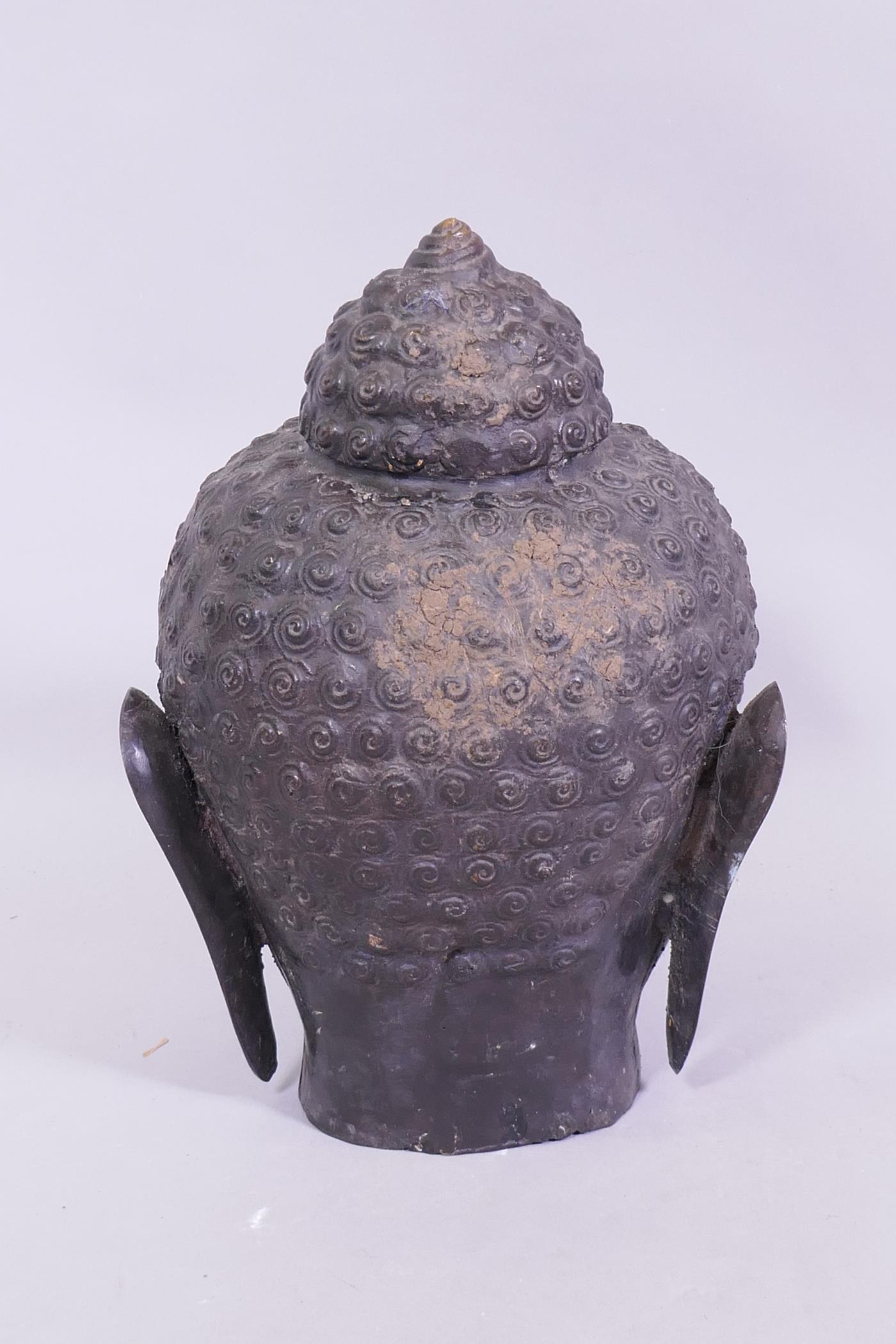 A hollow bronze Buddha's head, 30cm high - Image 4 of 5