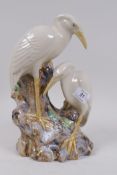 A majolica spill vase in the form of two cranes, 26cm high