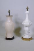 A Chinese style porcelain table lamp on carved wood base, 55cm high, and another