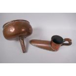 An antique copper funnel, 22cm diameter, and a copper slipper warmer