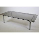 A chromed metal and smoked glass contemporary coffee table, 150cm x 74cm, 38cm high