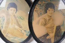 A pair of oval framed Japanese portrait prints of young women, 58 x 42cm