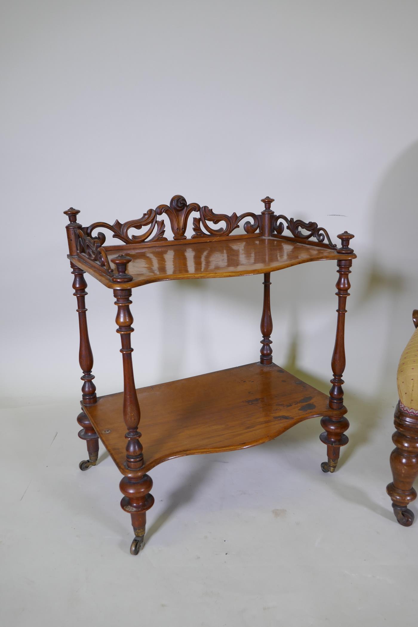 A Victorian walnut two tier occasional table with carved and pierced three quarter gallery top and - Image 2 of 3
