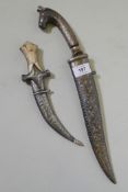 An Estern Khanjar dagger with decorative sheath and horse mask handle, 40cm long, and a smaller
