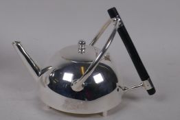 A silver plated teapot after a design by Christopher Dresser, 15cm high