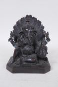 A patinated bronze figure of Ganesh, 13cm high