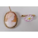 An antique cameo brooch and another flower brooch, largest 4 x 3cm