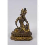 A Sino Tibetan gilt bronze figure of Buddha, 20cm high