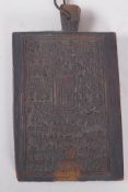 A Sino Tibetan carved wood calligraphy tablet, 20 x 12cm