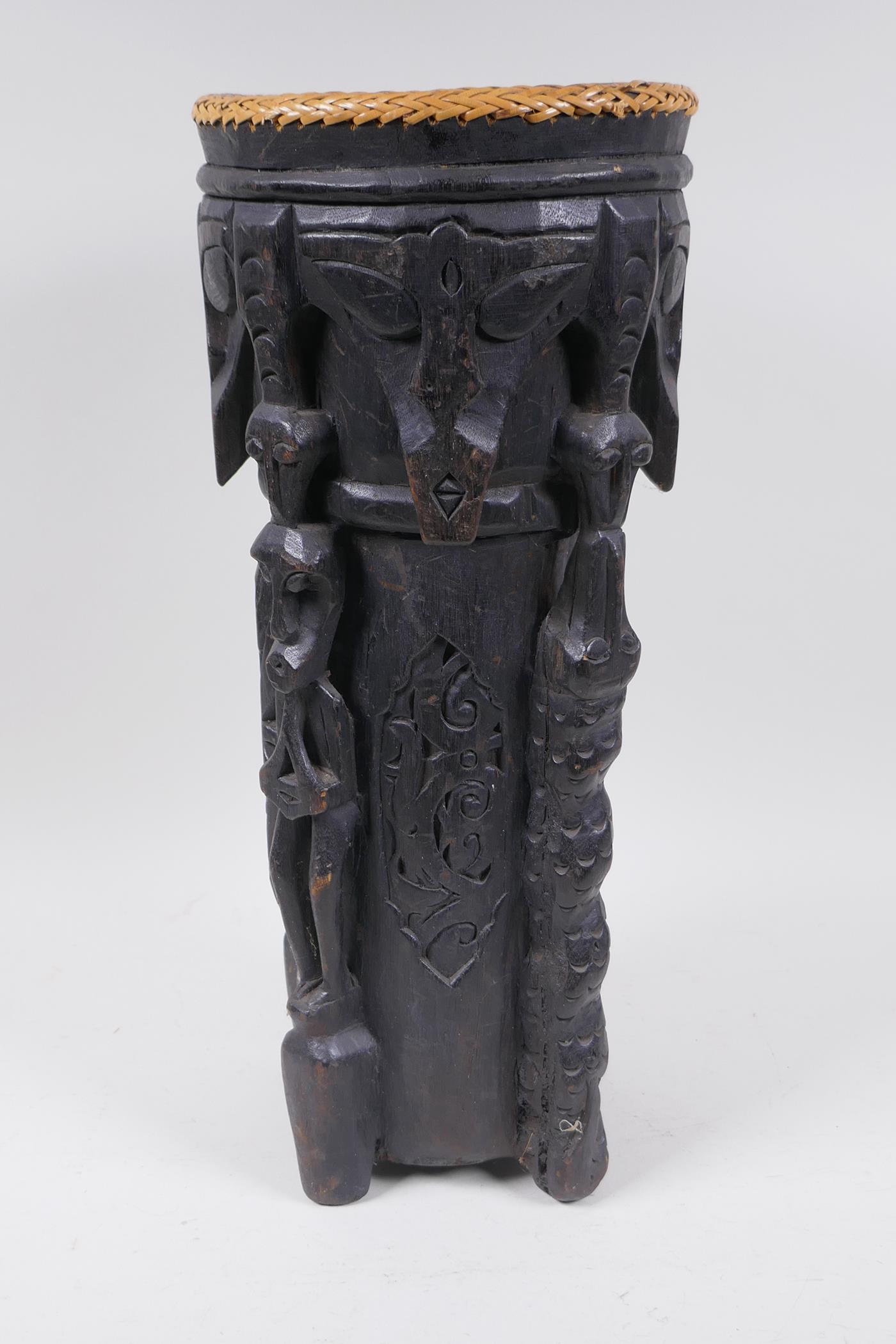 An Indonesian Dayak tribal carved and ebonised wood stick stand with figural and animal - Image 4 of 6