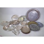 A quantity of silver plated trays, Eastern trays etc
