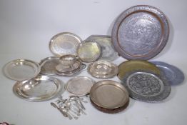 A quantity of silver plated trays, Eastern trays etc