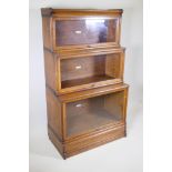 A 1920s Globe Wernicke oak stepped three section bookcase, 87 x 49cm, 151cm high