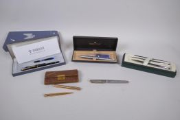 An early C20th Parker Jackknife Lucky Curve gold filled fountain pen and matching propelling pencil,