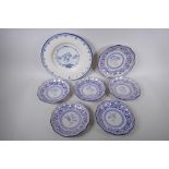 Seven Italian Majolica plates with shaped rims and putti decoration, largest 32cm diameter