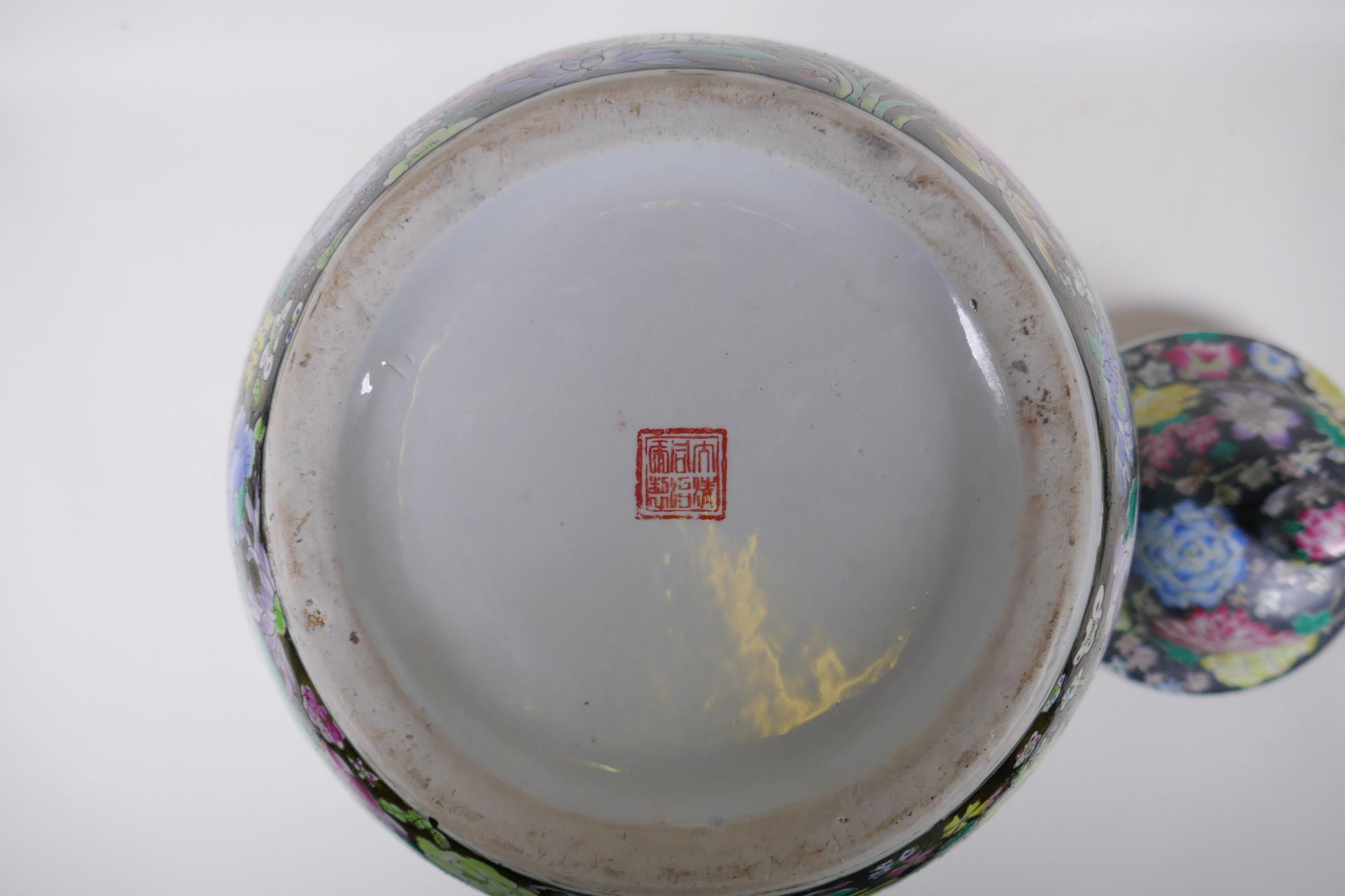 A Chinese famille noire jar with millefiori decoration and painted landscape panels, seal mark to - Image 6 of 7