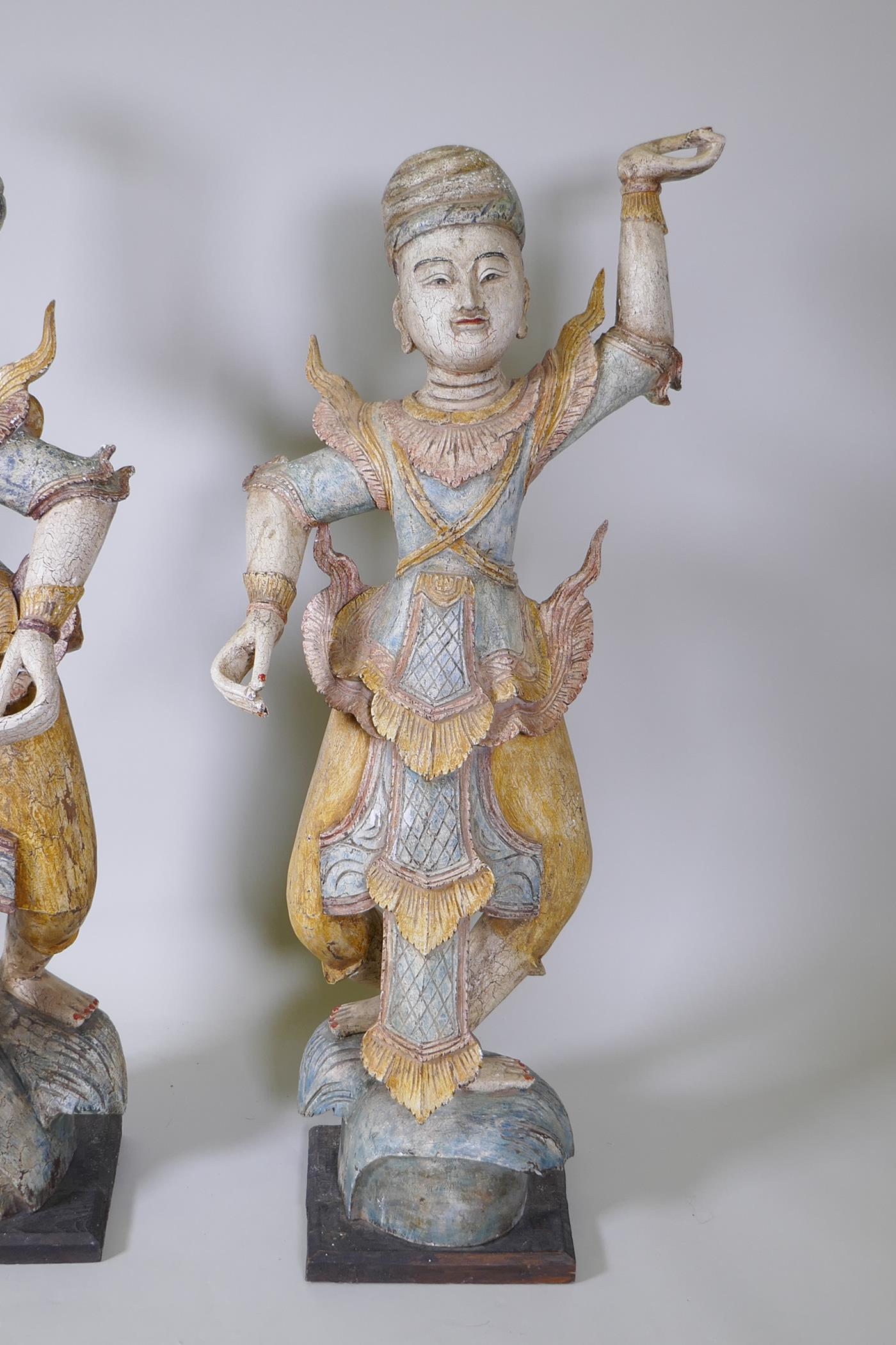 A pair of Indian carved and painted hardwood figures of dancers, 117cm high - Image 3 of 6