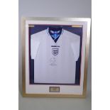 A Euro '96 England football shirt signed by Alan Shearer, framed, 87 x 105cm