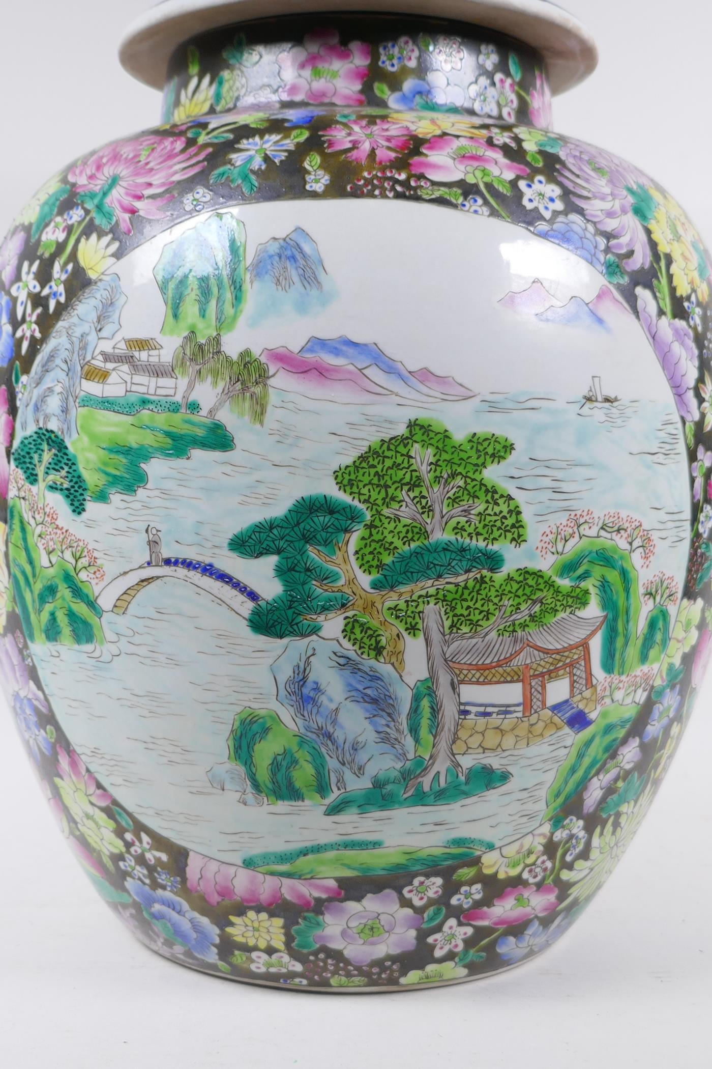 A Chinese famille noire jar with millefiori decoration and painted landscape panels, seal mark to - Image 2 of 7