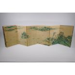 A Chinese printed concertina book decorated with an extensive riverside landscape, 18 x 28cm