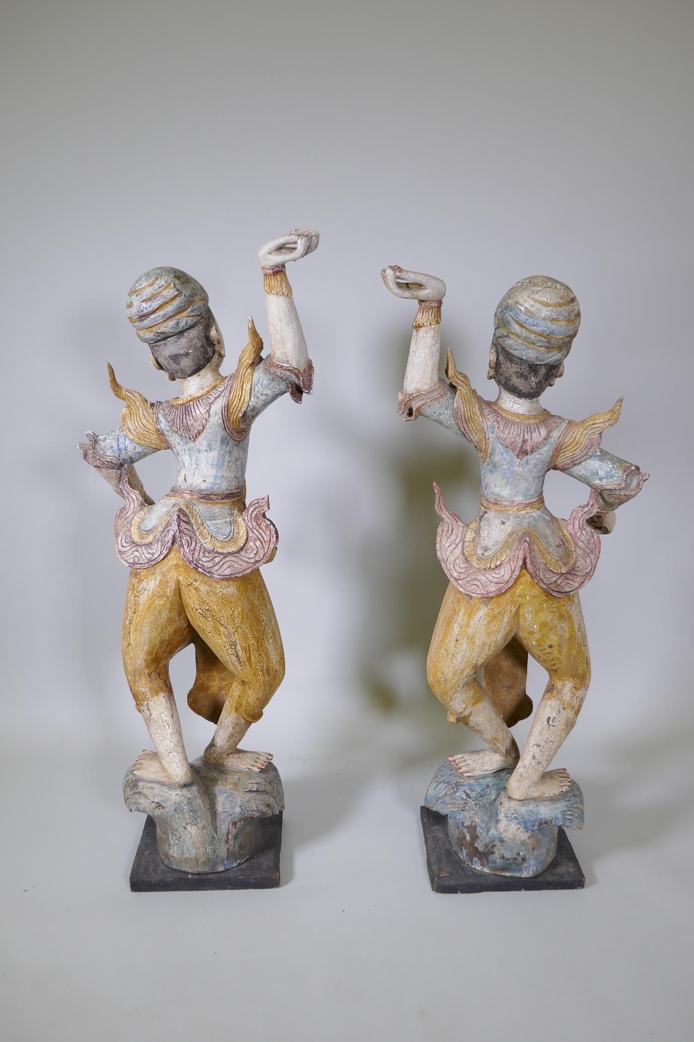 A pair of Indian carved and painted hardwood figures of dancers, 117cm high - Image 6 of 6