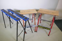 A pair of Draper folding adjustable trestles and two Workmate type folding work benches