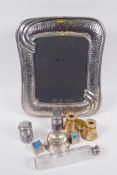 A silver plated photo frame, 34 x 28cm overall, a pair of mother of pearl and brass opera glasses,