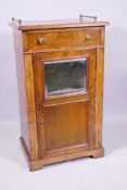 A Victorian burr walnut side cabinet with single drawer over a mirrored door and cupboard with three