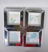 A set of four mirrored glass photo frames, apertures 10cm square, one minor chip
