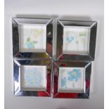 A set of four mirrored glass photo frames, apertures 10cm square, one minor chip