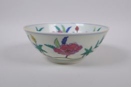 A Wucai porcelain bowl with floral decoration, Chinese Chenghua 6 character mark to base, 19cm
