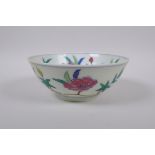 A Wucai porcelain bowl with floral decoration, Chinese Chenghua 6 character mark to base, 19cm