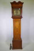 An oak longcase clock with C18th 30hour movement striking on a bell, the chapter ring inscribed