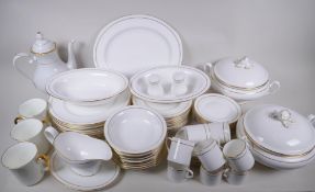 A Royal Worcester white and gilt Contessa pattern porcelain dinner service, ten place setting of 27,