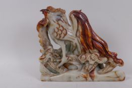 A Chinese carved soapstone figure of a cockerel, 23cm high