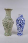 A C19th Chinese blue and white porcelain vase, decorated with figures, prunus blossom, vases and