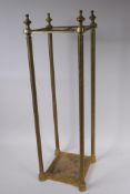 A brass stick stand, 62cm high, 19cm square