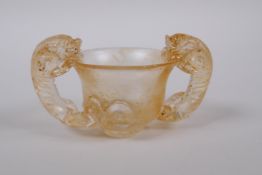 A Chinese glass libation cup with two kylin handles, 10 x 6cm