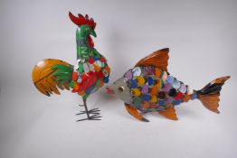 Two brightly painted metal figures, a cockerel, 28cm, and a fish