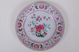 A C19th Chinese famille rose porcelain cabinet plate with floral decoration, 23cm diameter