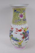 A Canton porcelain vase decorated in bright enamels of duelling warriors and their attendants, 6