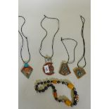 Four white metal pendants inset with coral and turquoise mosaic beads, 7cm long, and a bead necklace