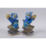 A pair of Chinese turquoise glazed porcelain figure of kylin, 14cm high