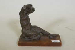 Abstract bronze figure of a seated nude, signed Lillie 60?, Lloyd Lillie? mounted on a wood base